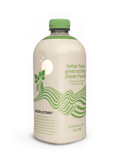 Wholemoon pistachio whole protein milk side angle featuring the brand's origin story and mission on minimalist beige packaging