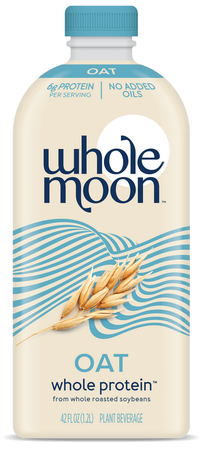 Wholemoon oat whole protein milk in beige packaging with oat photo, shown in portrait view with visible product name